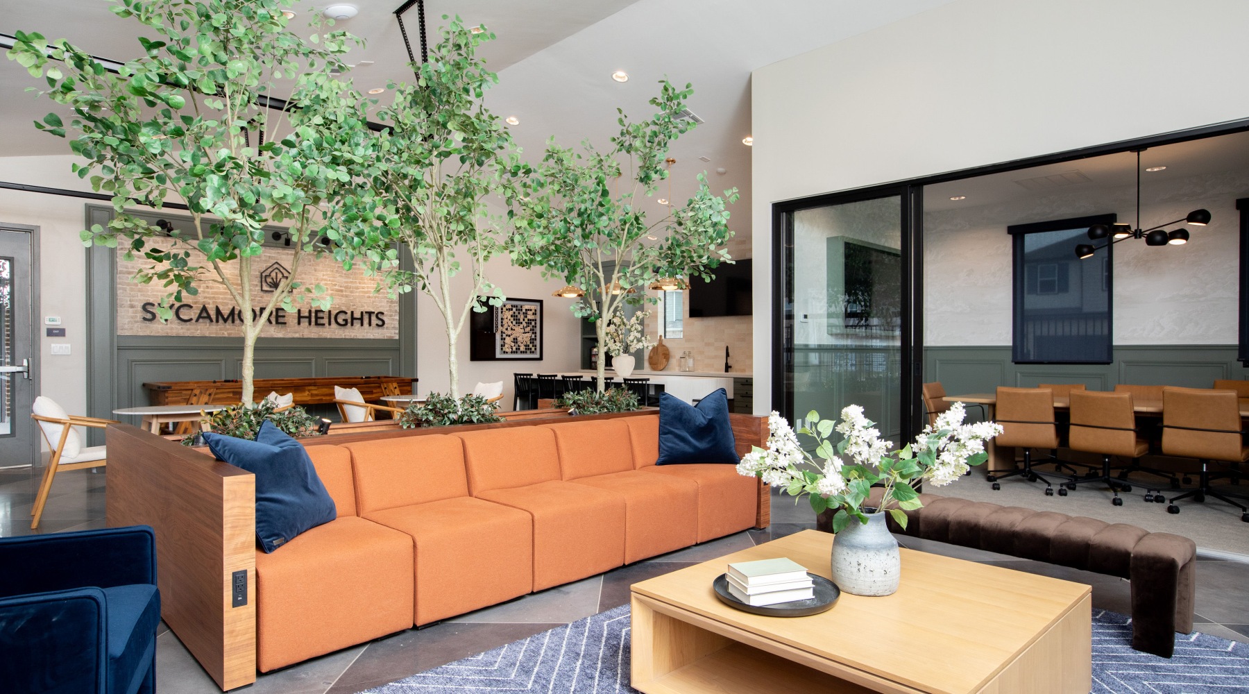 clubhouse with ample seating areas and games in the background