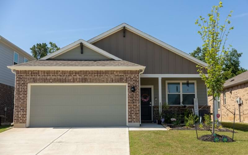 Street-level view of luxury homes in Spring, T