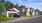people standing in front of a home