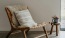 a chair with a pillow
